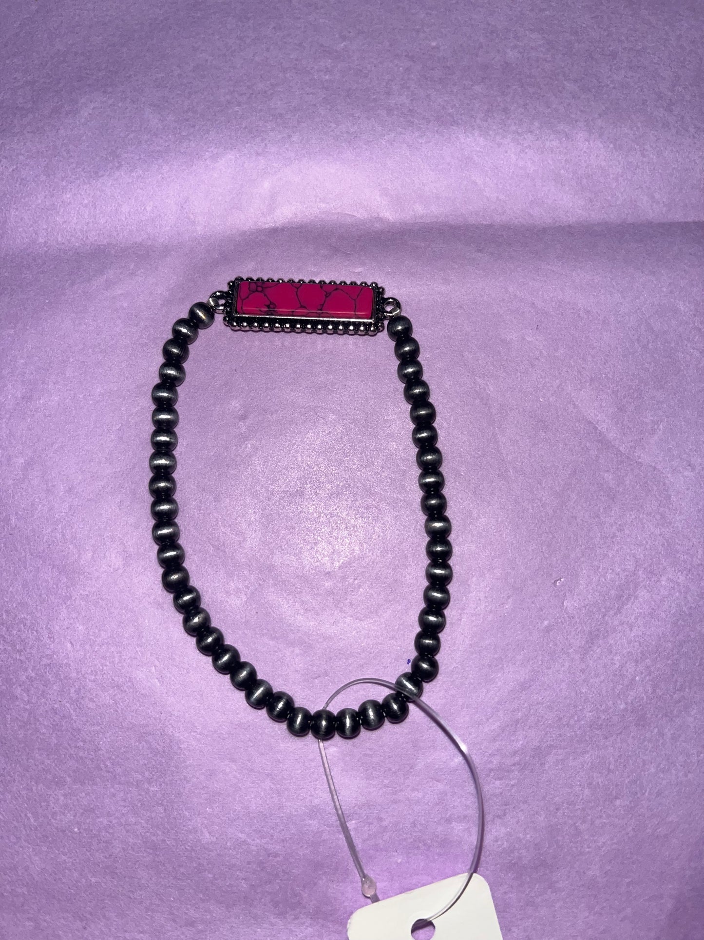 Pink pendant bracelet