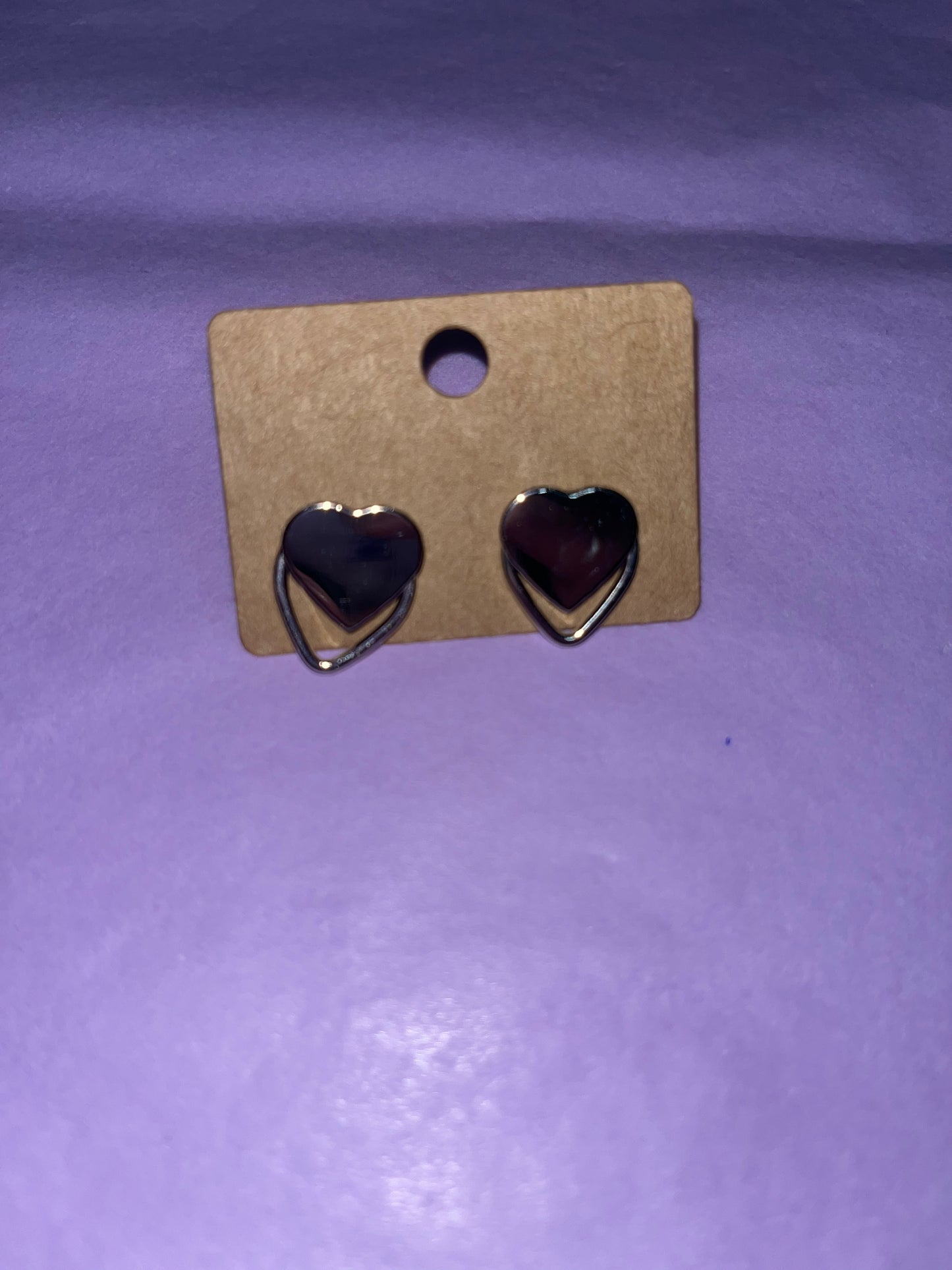 Silver heart shaped earrings