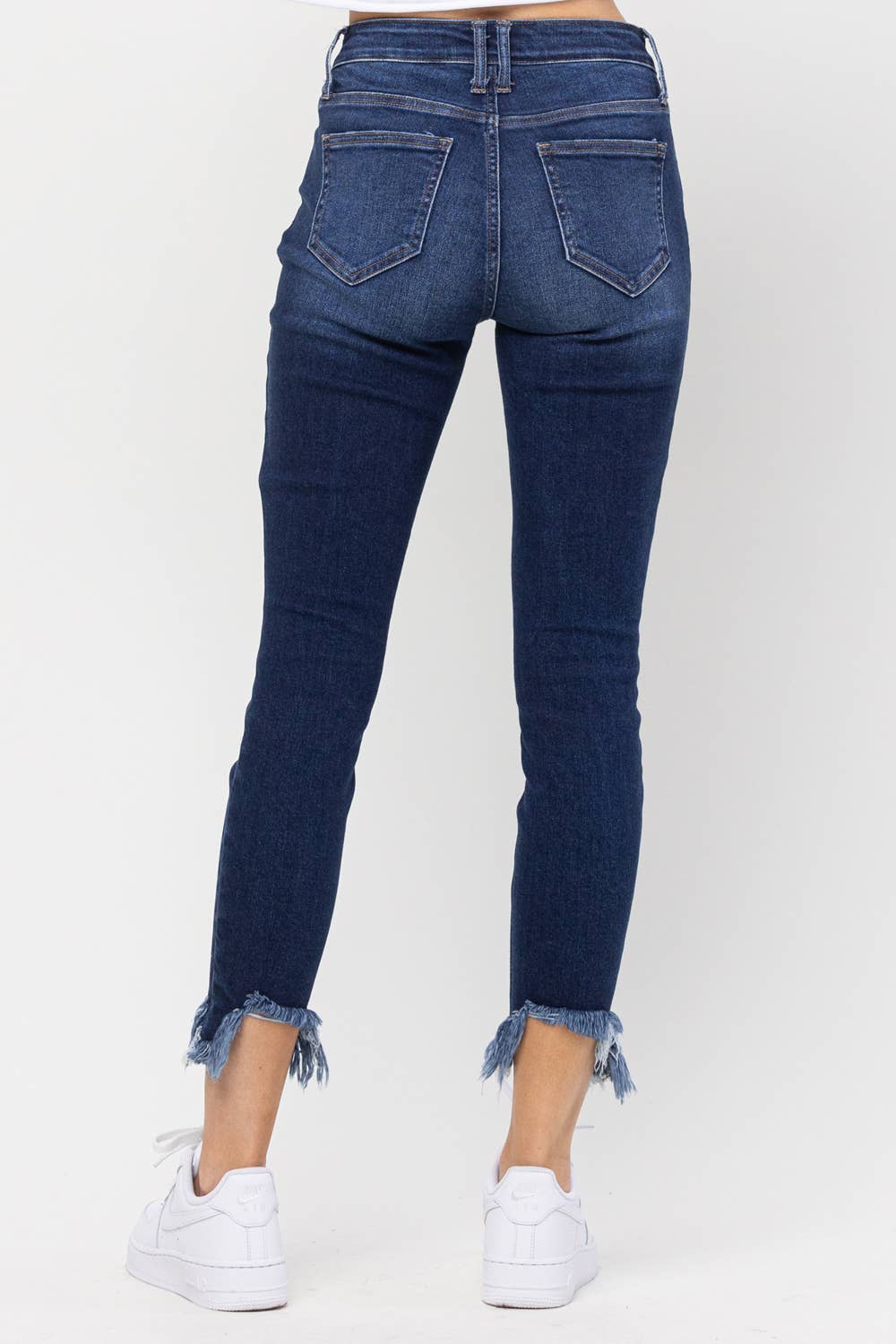 Mid Rise Chew Hem Skinny Jeans- Dark Wash
