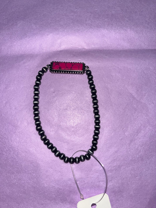 Pink pendant bracelet