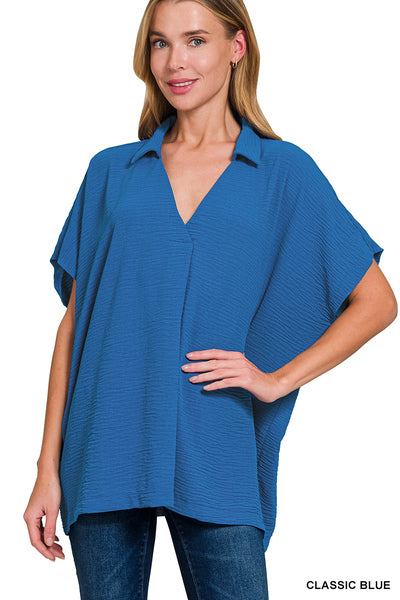 Woven airflow collared v-neck short sleeve top