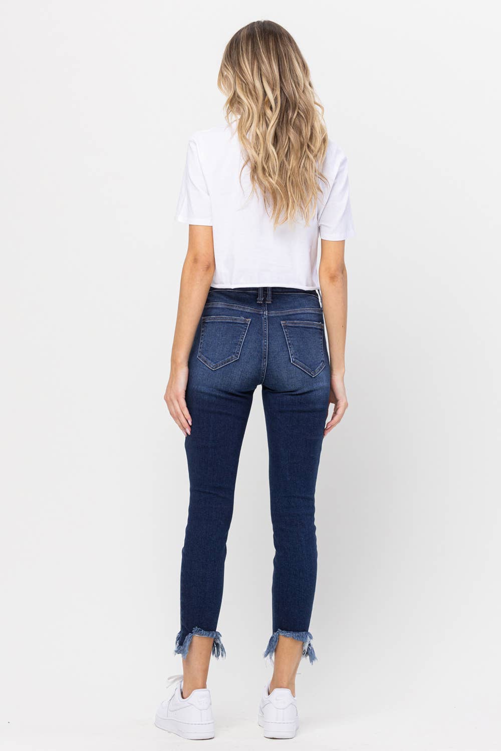 Mid Rise Chew Hem Skinny Jeans- Dark Wash